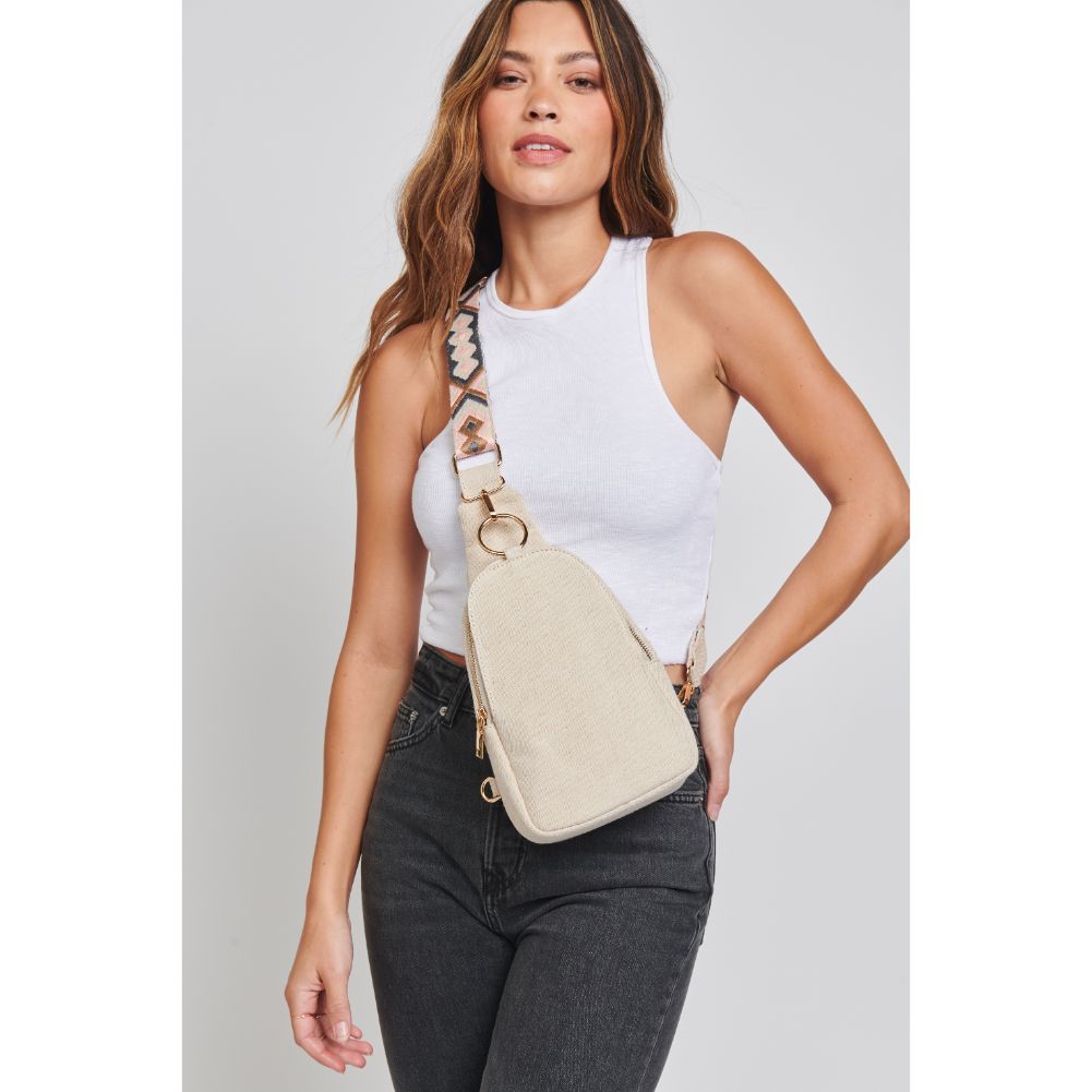 Woman wearing Oatmeal Moda Luxe Regina Canvas Sling Backpack 842017131007 View 1 | Oatmeal