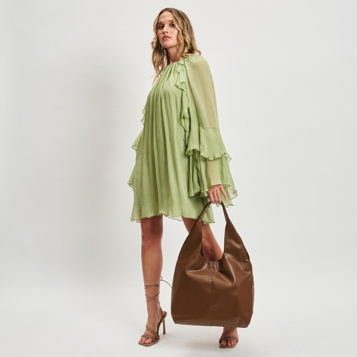 Woman wearing Chocolate Moda Luxe Faye Hobo 842017138785 View 2 | Chocolate