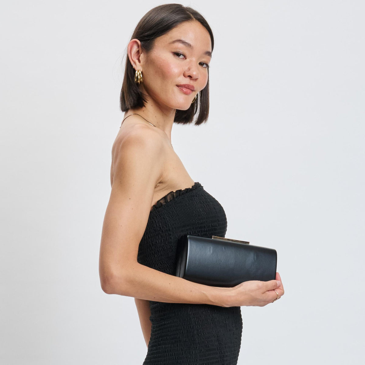 Woman wearing Black Moda Luxe Sienna Evening Bag 842017139737 View 1 | Black