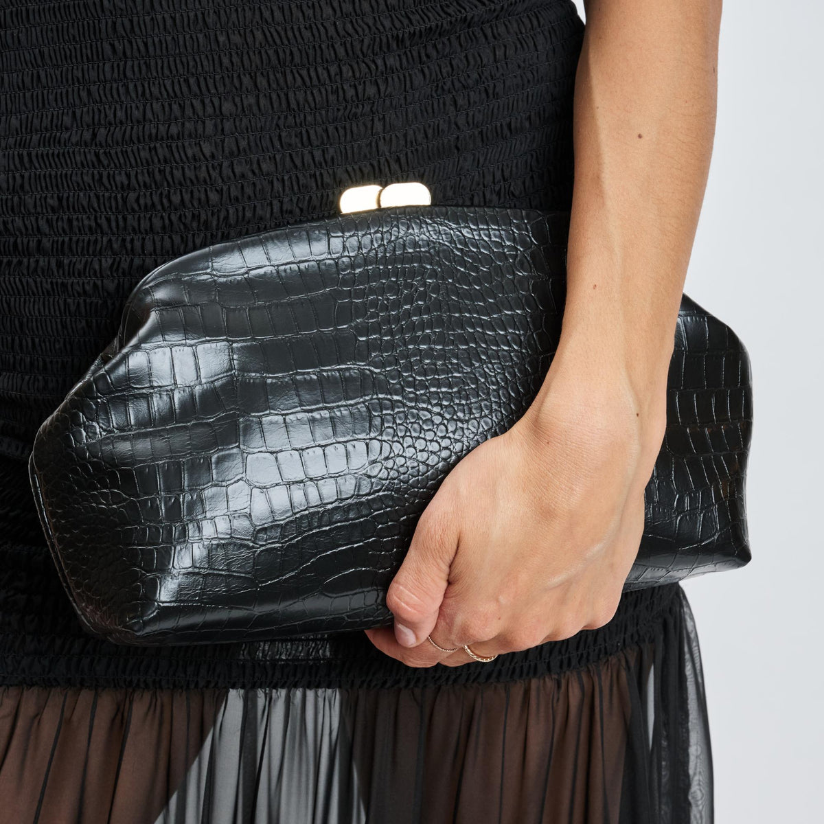 Woman wearing Black Moda Luxe Camille Clutch 842017139164 View 1 | Black