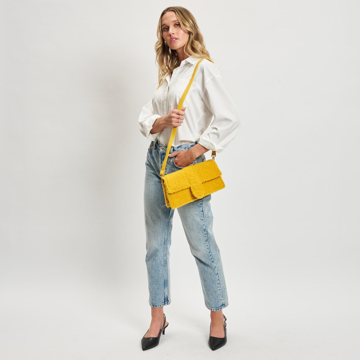 Woman wearing Mustard Moda Luxe Fergie Crossbody 842017133728 View 3 | Mustard