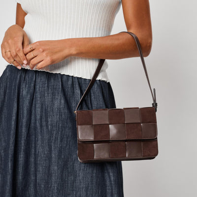 Woman wearing Chocolate Moda Luxe Tanya Crossbody 842017142904 View 1 | Chocolate