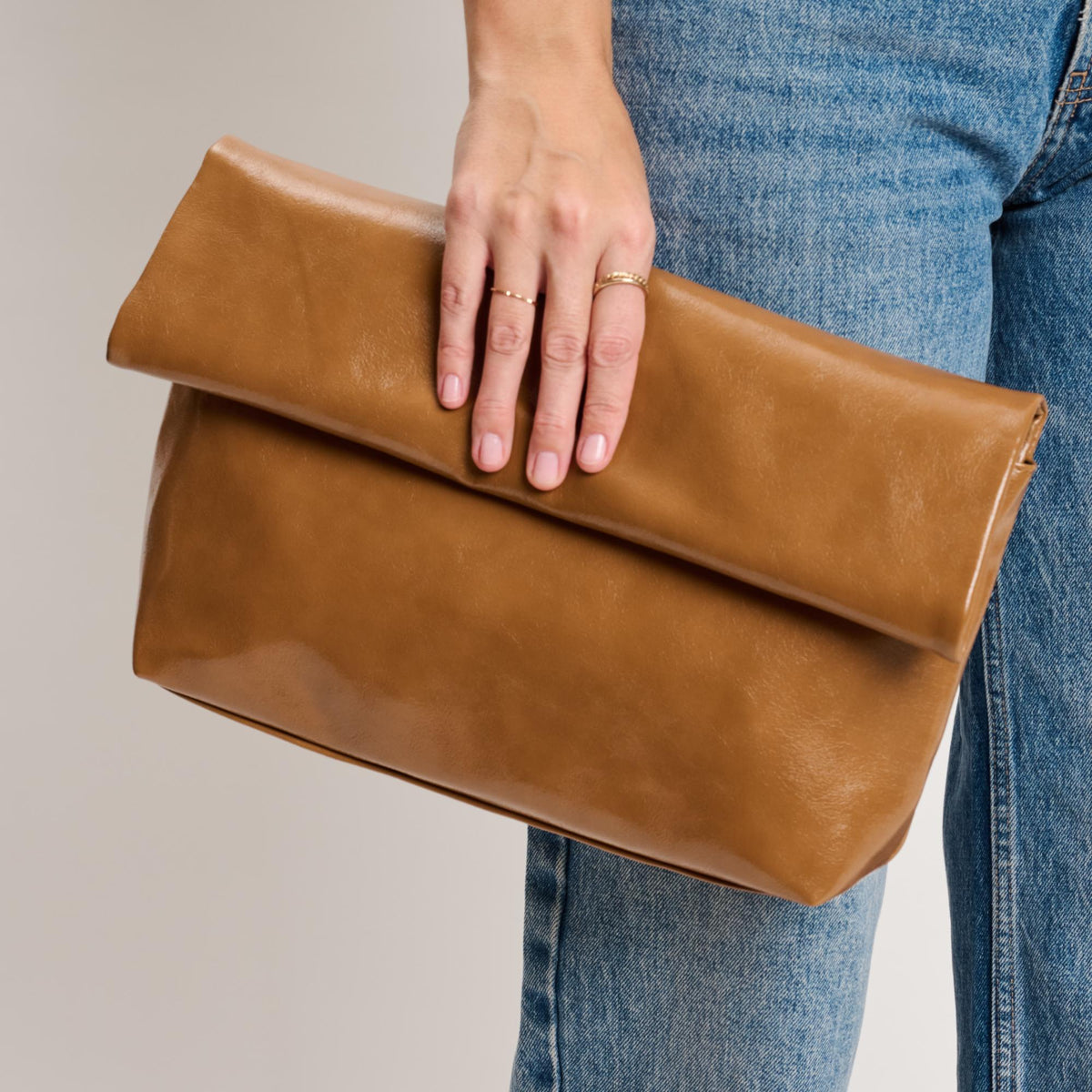 Woman wearing Caramel Moda Luxe Angela Crossbody 842017141662 View 3 | Caramel