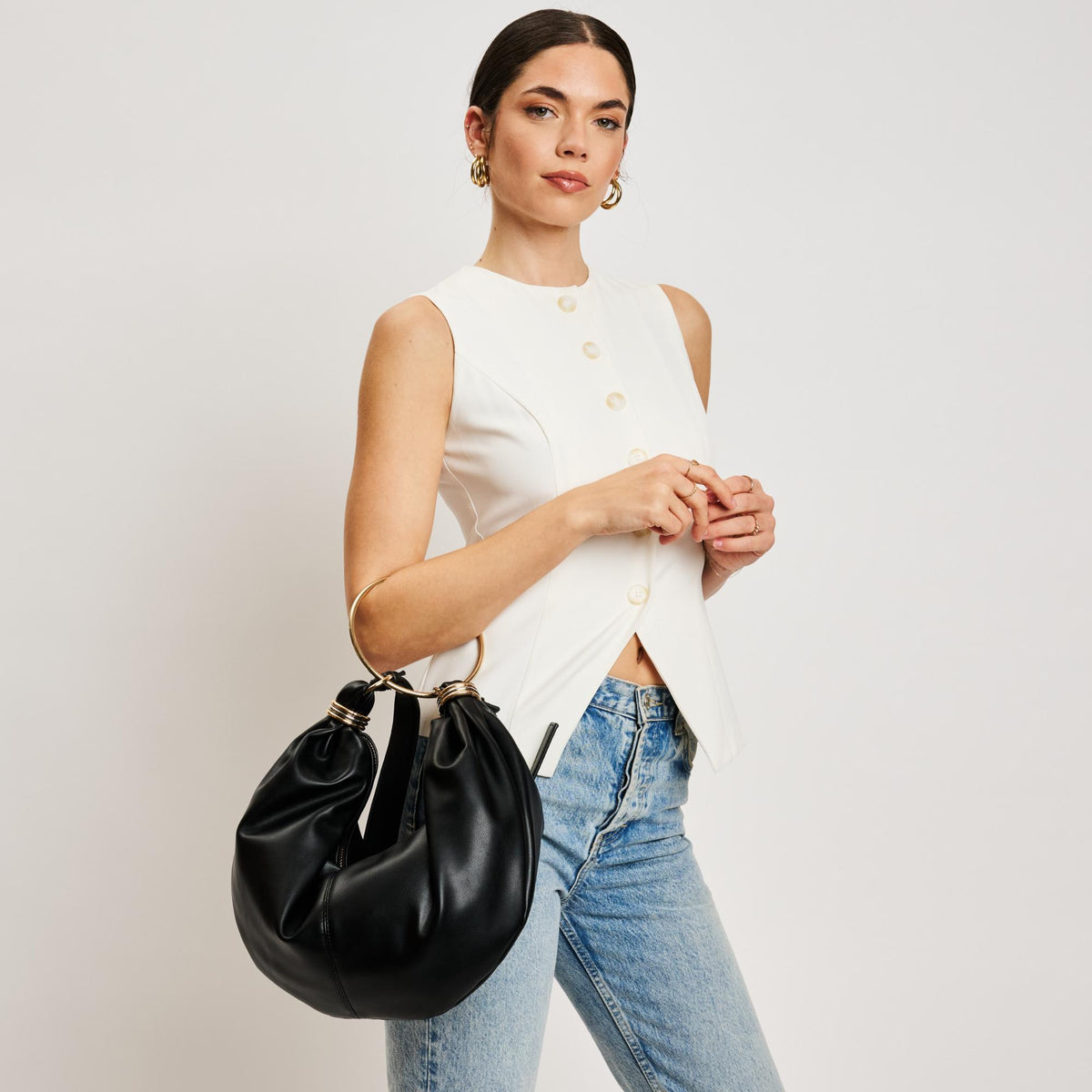 Woman wearing Black Moda Luxe Azura Crossbody 842017137986 View 1 | Black