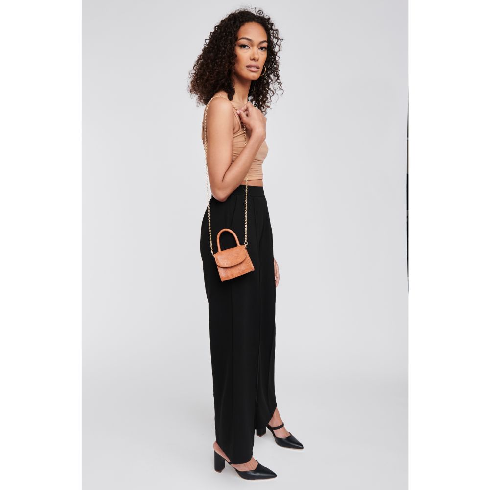 Woman wearing Tan Moda Luxe Farah Crossbody 842017127598 View 4 | Tan