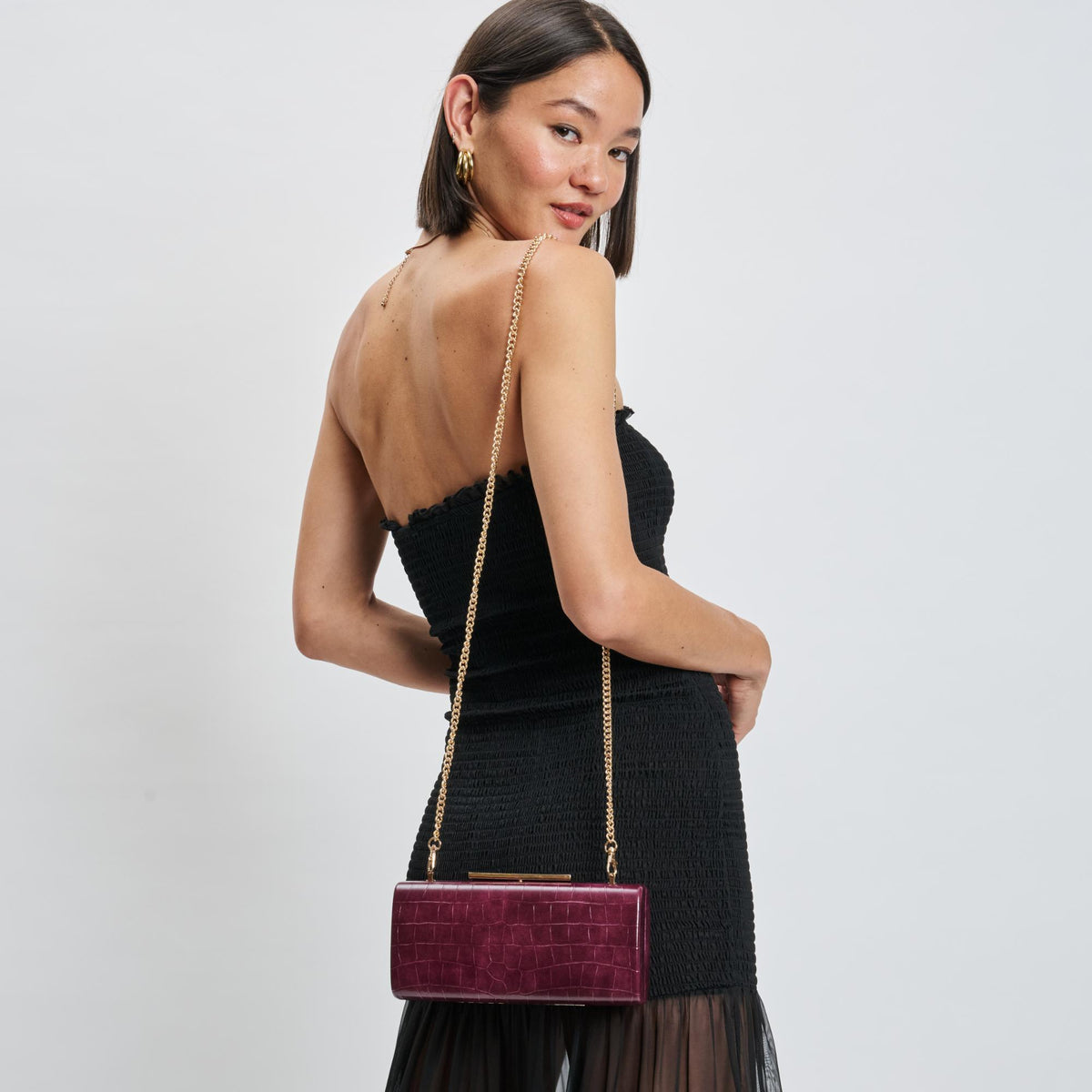 Woman wearing Wine Moda Luxe Sienna Evening Bag 842017139744 View 1 | Wine