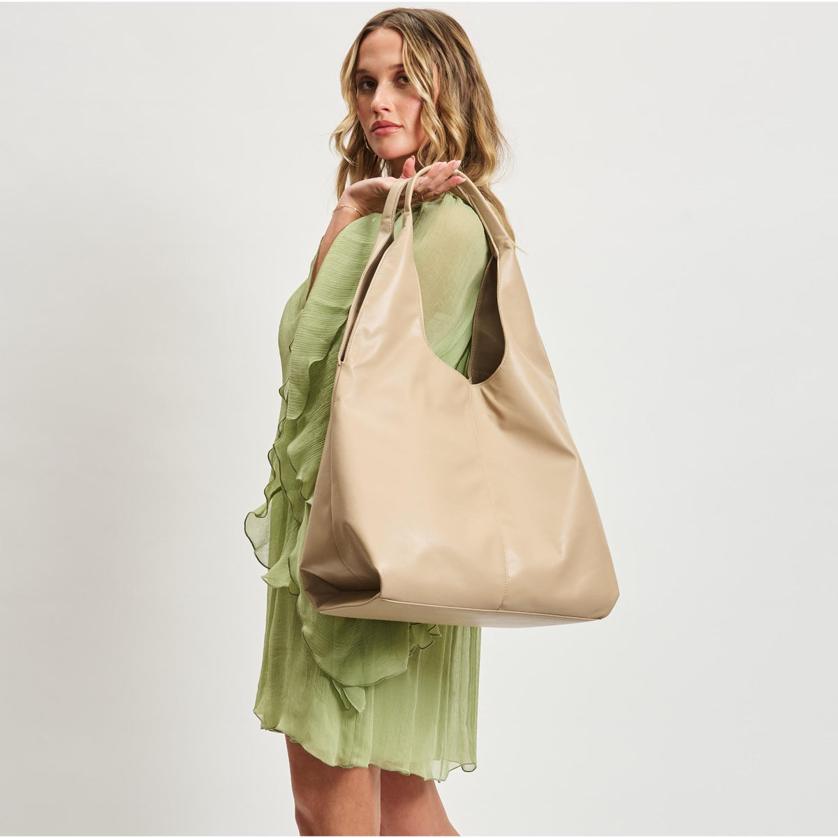 Woman wearing Natural Moda Luxe Faye Hobo 842017138761 View 2 | Natural