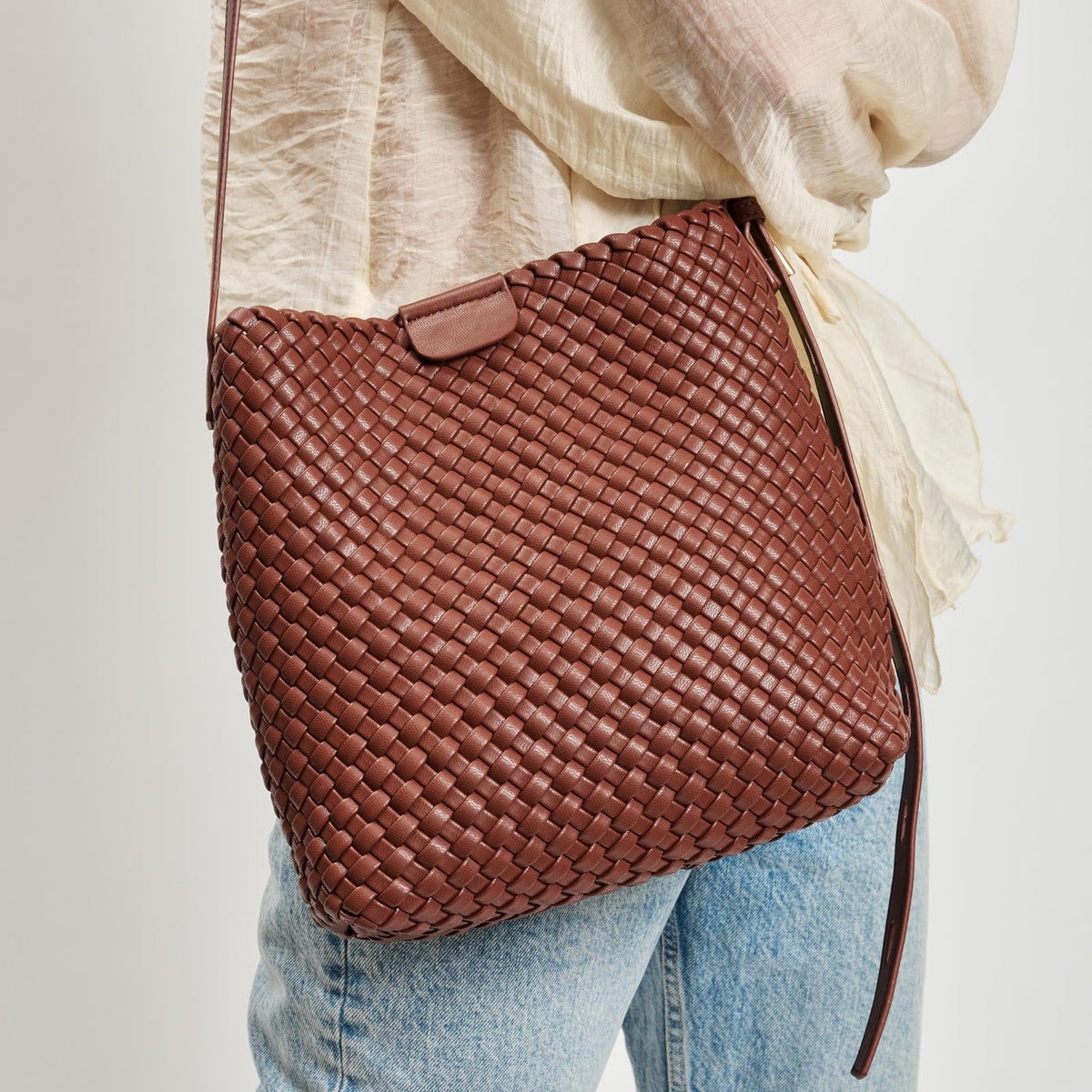 Woman wearing Chocolate Moda Luxe Isadora Bucket 842017137351 View 4 | Chocolate