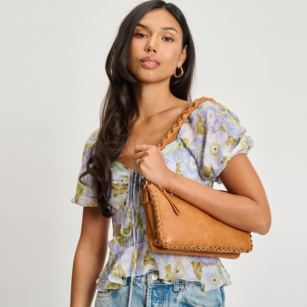 Woman wearing Tan Moda Luxe Velveta Crossbody 842017135364 View 1 | Tan