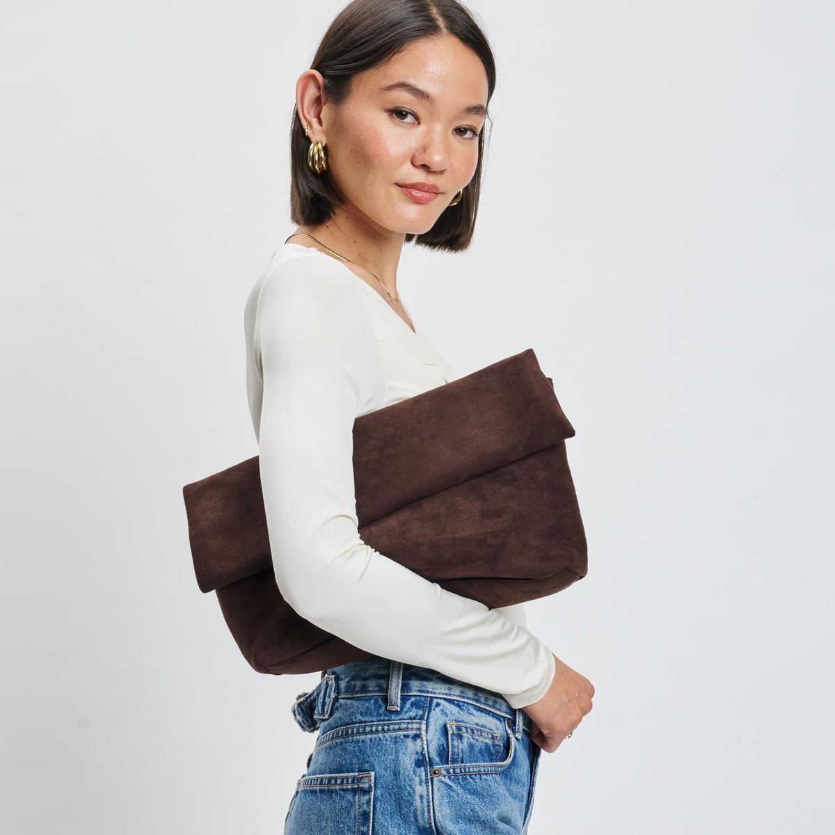 Woman wearing Chocolate Moda Luxe Zarae Crossbody 842017139997 View 3 | Chocolate