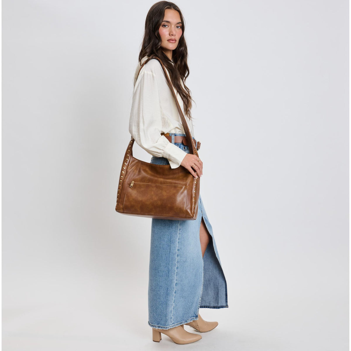 Woman wearing Chocolate Moda Luxe Electra Crossbody 842017136187 View 3 | Chocolate