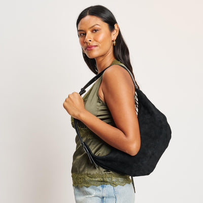 Woman wearing Black Moda Luxe Elodie Shoulder Bag 842017139003 View 1 | Black