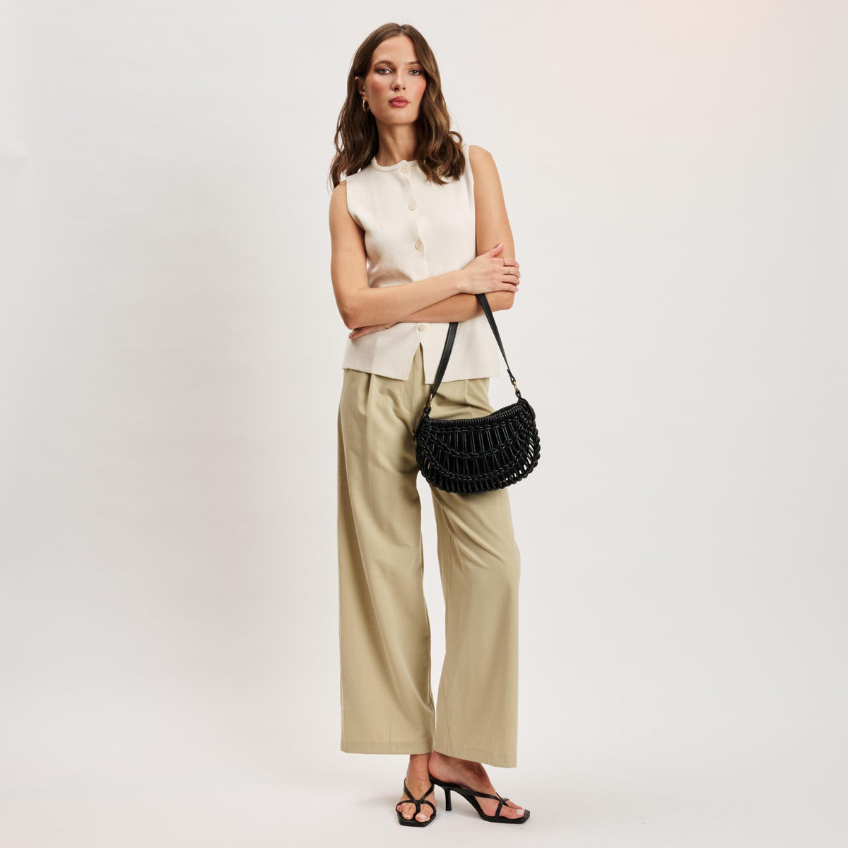 Woman wearing Black Moda Luxe Francesca Clutch 842017141389 View 4 | Black