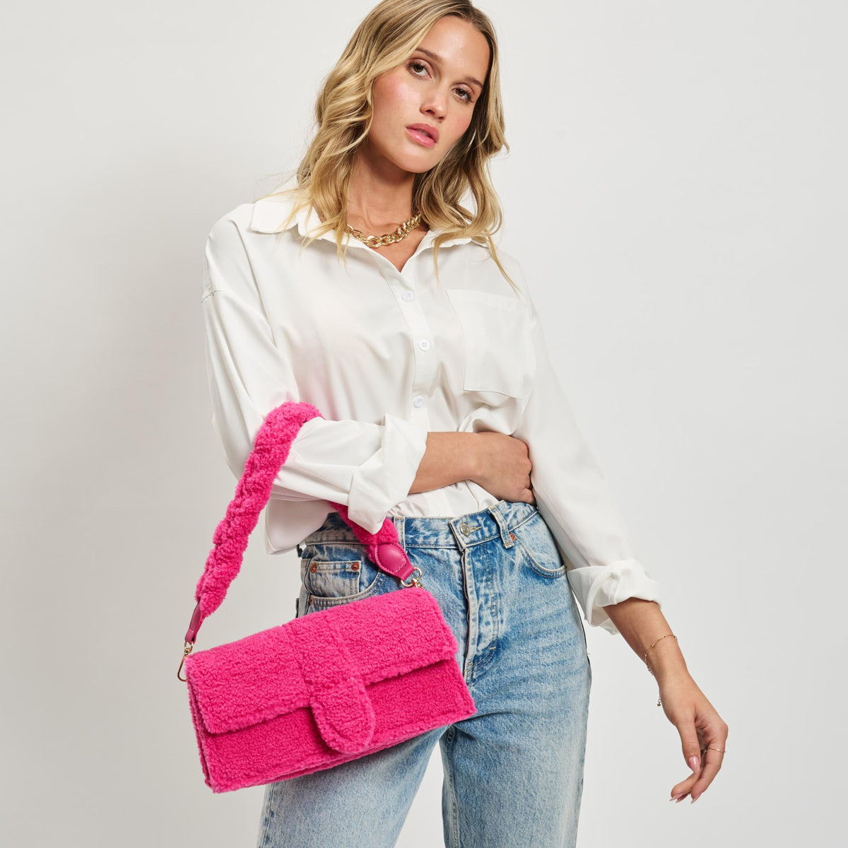 Woman wearing Hot Pink Moda Luxe Fergie Crossbody 842017133704 View 2 | Hot Pink