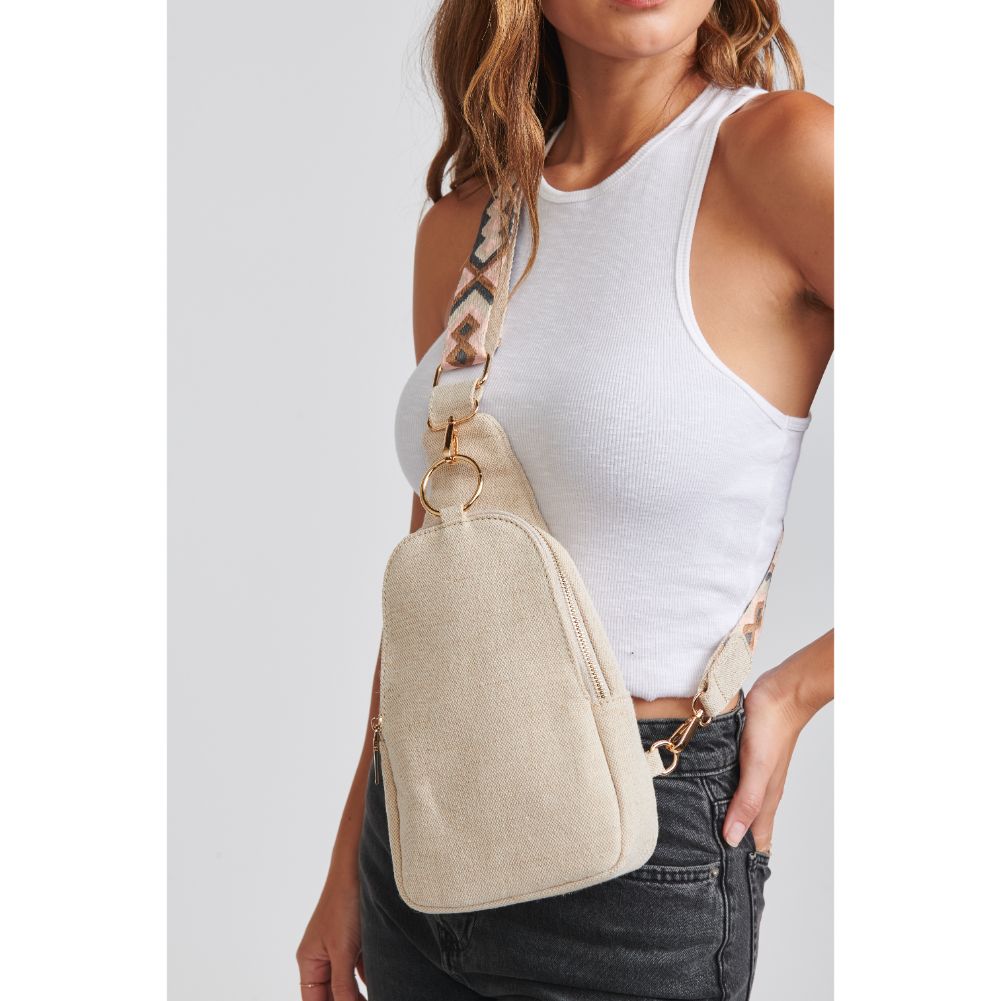 Woman wearing Oatmeal Moda Luxe Regina Canvas Sling Backpack 842017131007 View 2 | Oatmeal