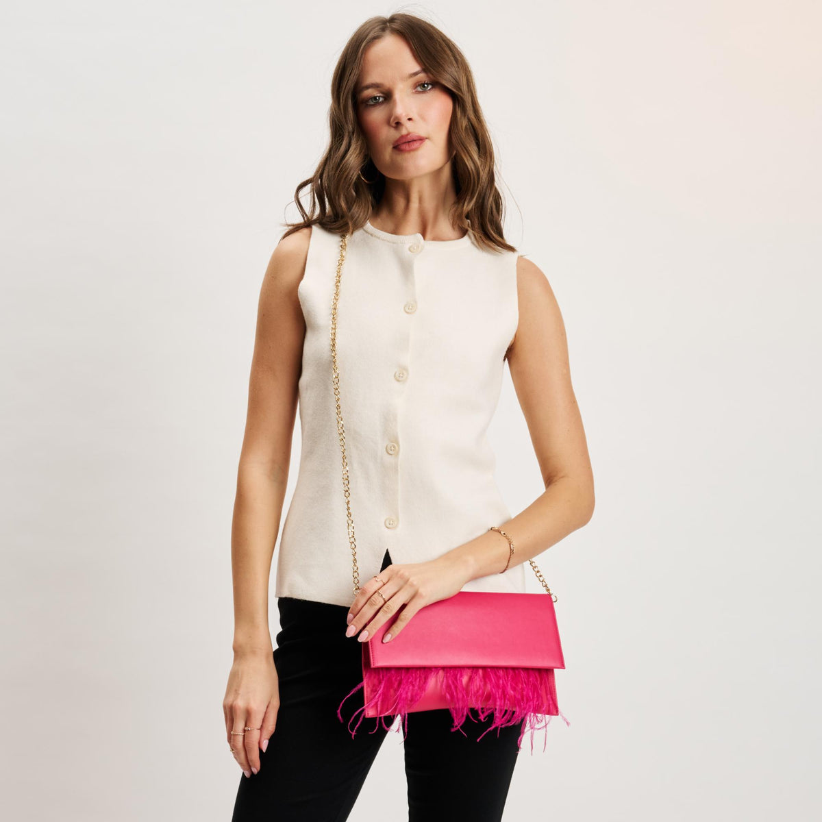 Woman wearing Hot Pink Moda Luxe Everlee Clutch 842017131151 View 4 | Hot Pink