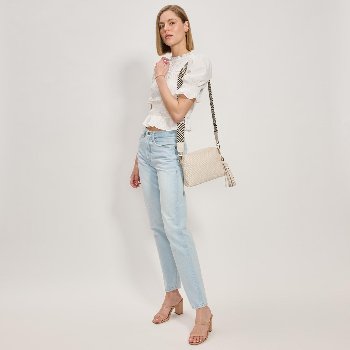 Woman wearing Ivory Moda Luxe Roxana Crossbody 842017137436 View 3 | Ivory