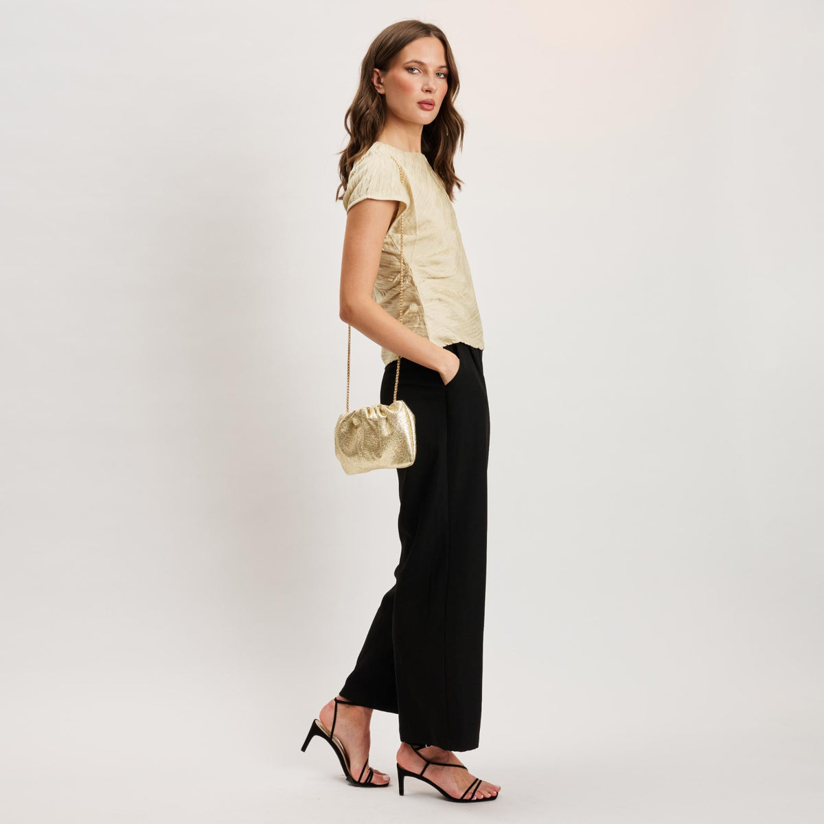 Woman wearing Gold Moda Luxe Fancy Clutch 842017141334 View 3 | Gold