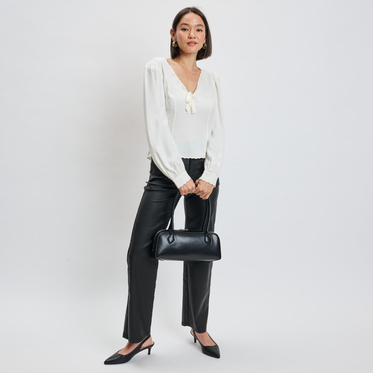Woman wearing Black Moda Luxe Betty Shoulder Bag 842017139393 View 3 | Black