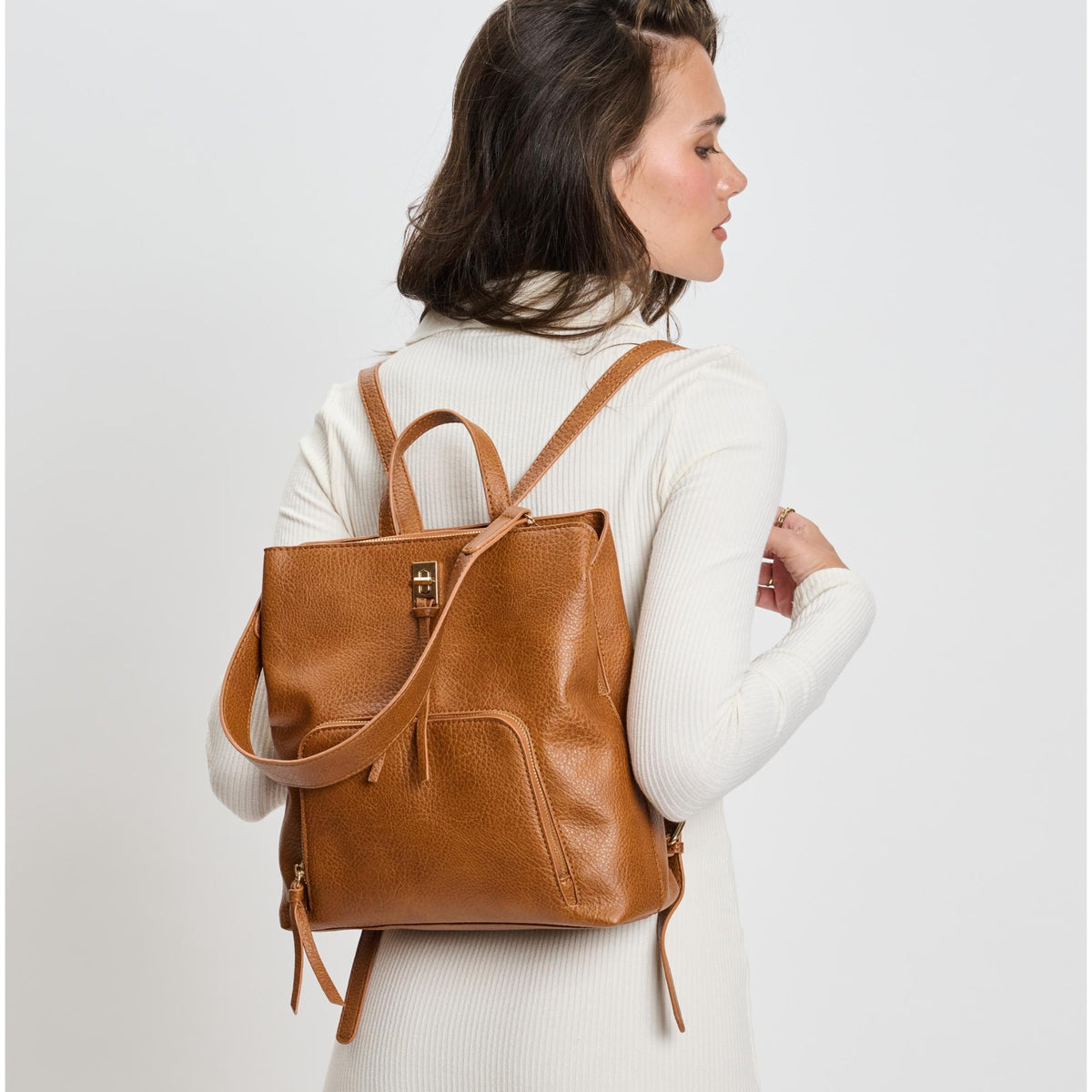 Woman wearing Cognac Moda Luxe Genevieve Backpack 842017136088 View 1 | Cognac