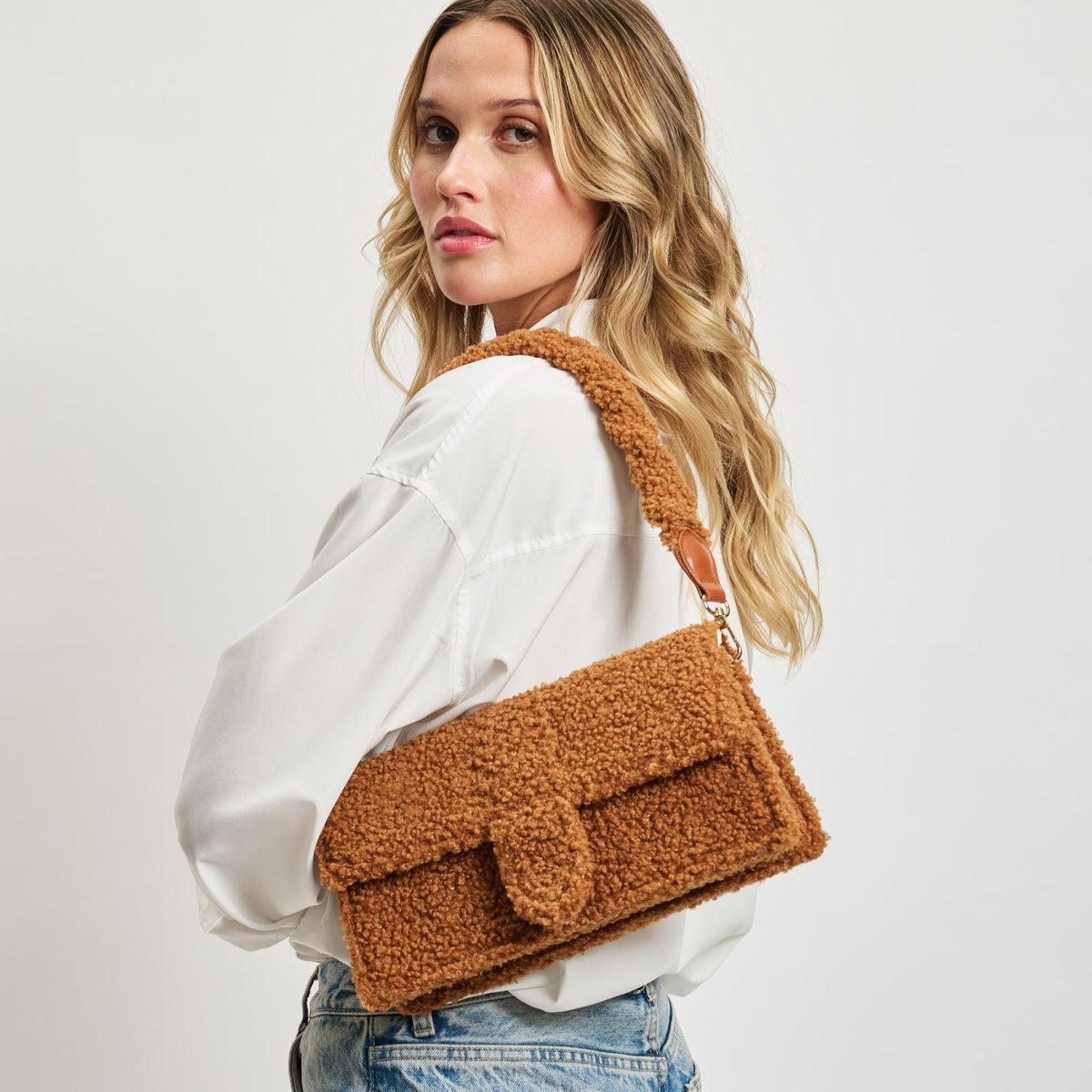 Woman wearing Tan Moda Luxe Fergie Crossbody 842017133735 View 2 | Tan