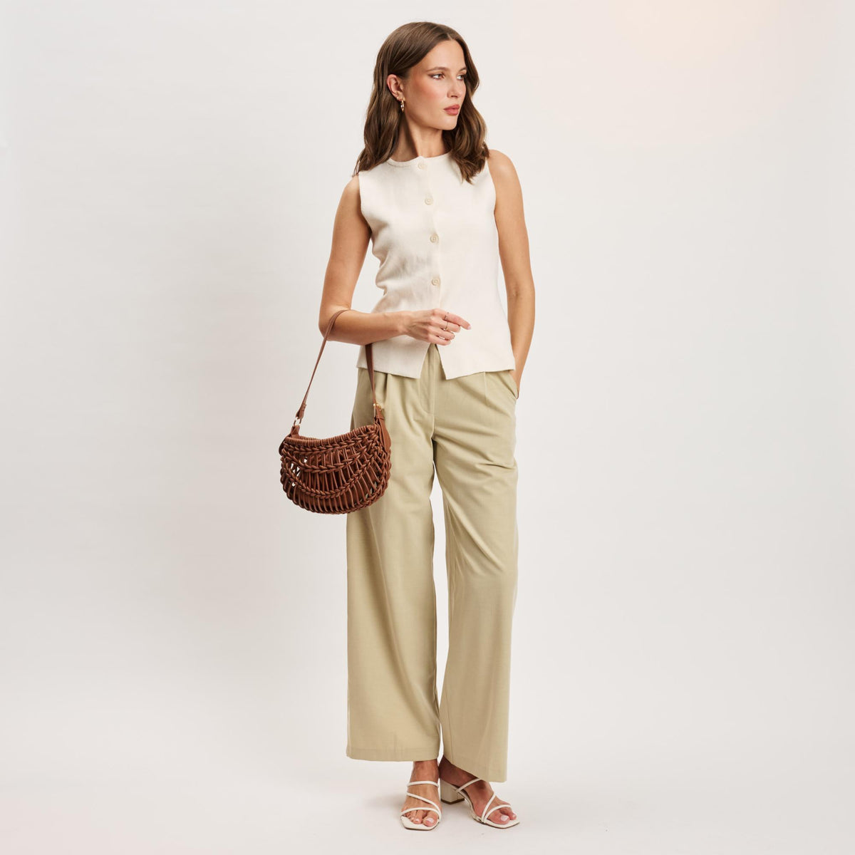 Woman wearing Cognac Moda Luxe Francesca Clutch 842017141396 View 4 | Cognac