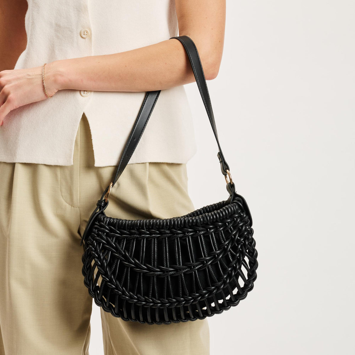 Woman wearing Black Moda Luxe Francesca Clutch 842017141389 View 1 | Black