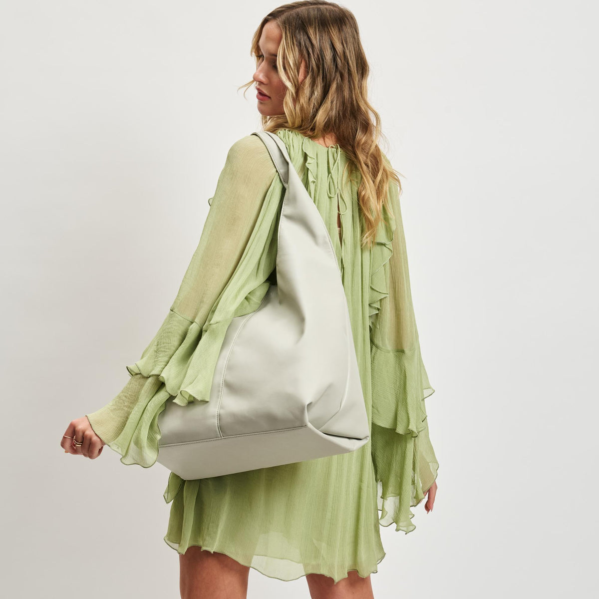 Woman wearing Bone Moda Luxe Faye Hobo 842017138778 View 2 | Bone