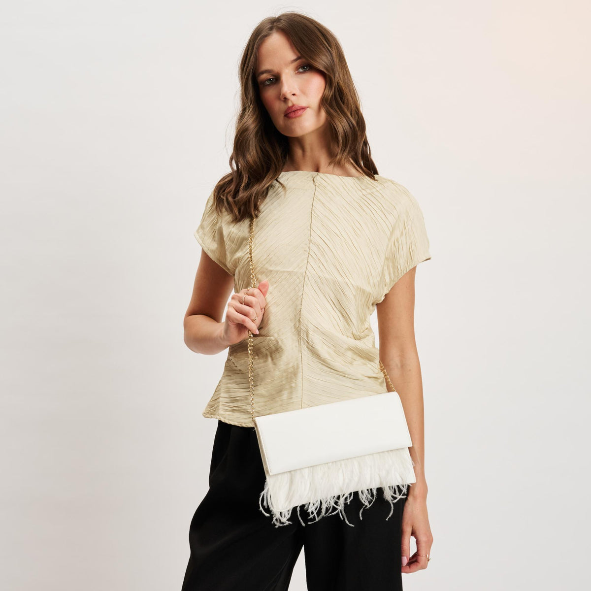 Woman wearing White Moda Luxe Everlee Clutch 842017131120 View 2 | White