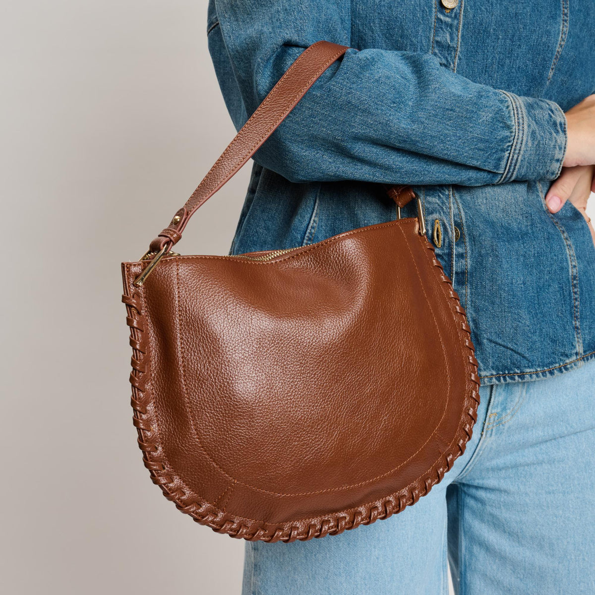 Woman wearing Chocolate Moda Luxe Lita Hobo 842017141082 View 1 | Chocolate
