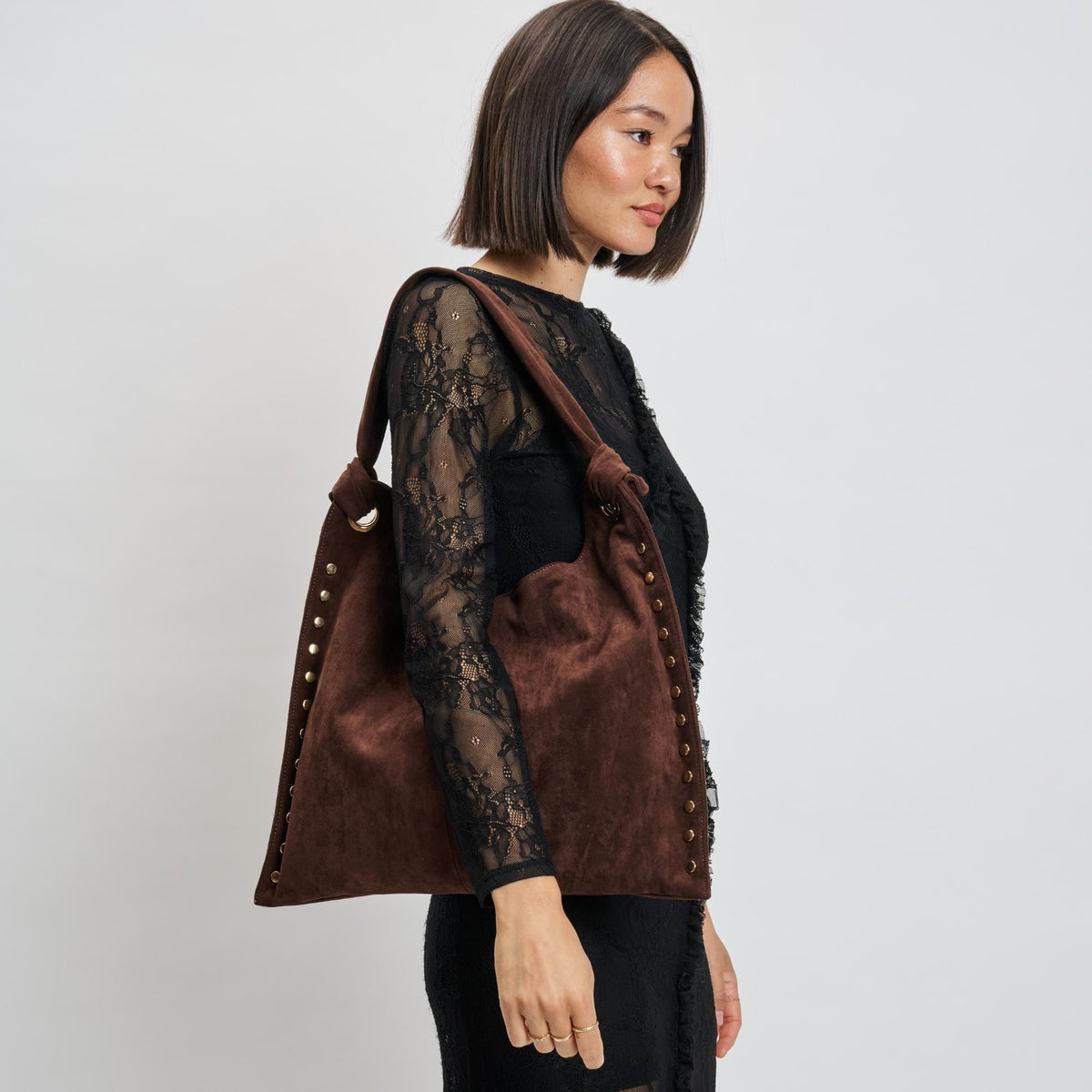 Woman wearing Chocolate Moda Luxe Meadow Hobo 842017139942 View 2 | Chocolate