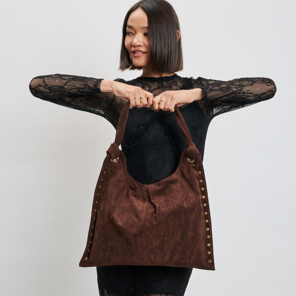 Woman wearing Chocolate Moda Luxe Meadow Hobo 842017139942 View 3 | Chocolate
