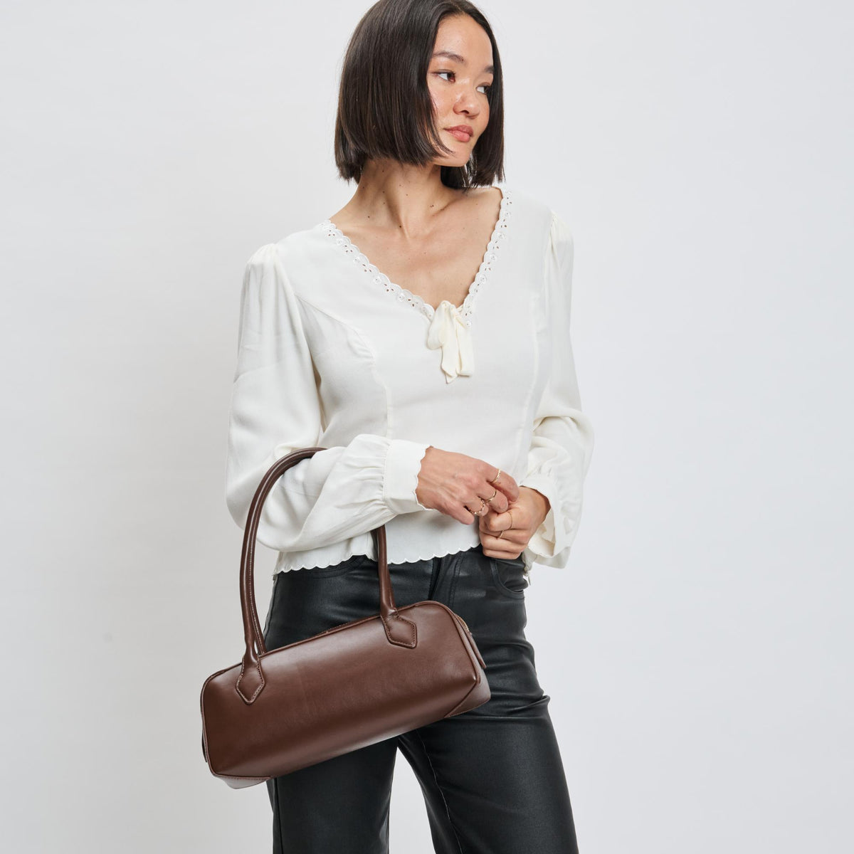 Woman wearing Espresso Moda Luxe Betty Shoulder Bag 842017139430 View 1 | Espresso