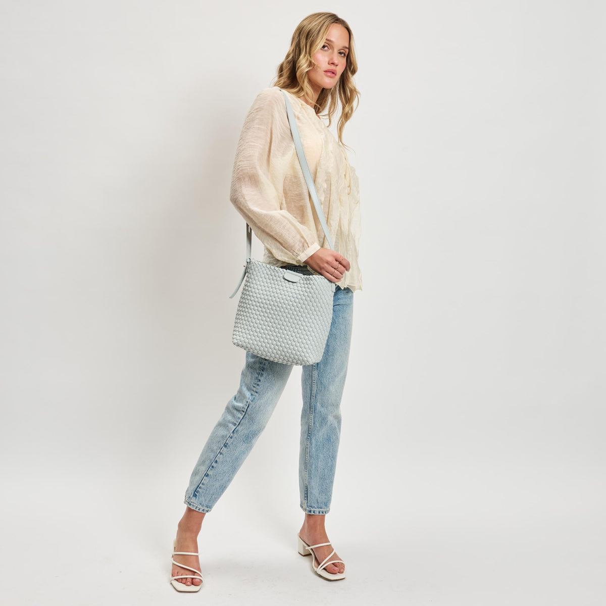 Woman wearing Ice Blue Moda Luxe Isadora Bucket 842017137344 View 3 | Ice Blue