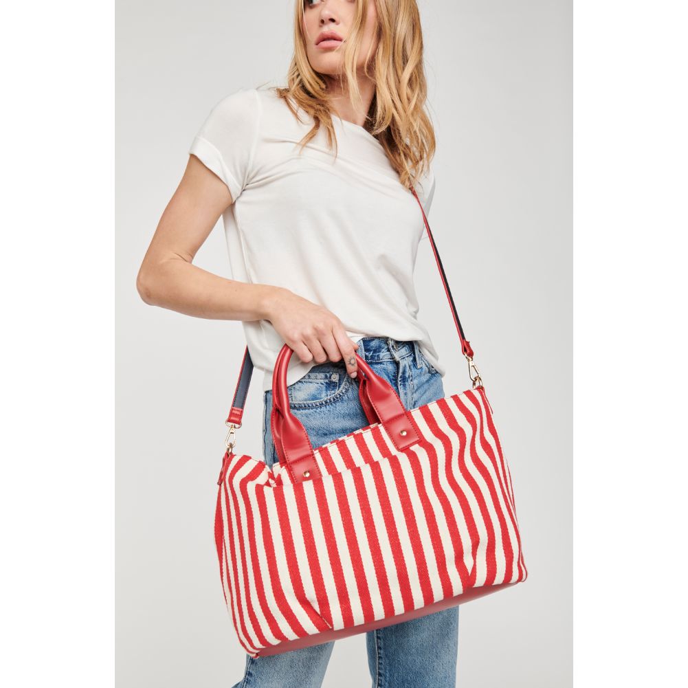Woman wearing Red Moda Luxe Bali Satchel 842017113003 View 1 | Red