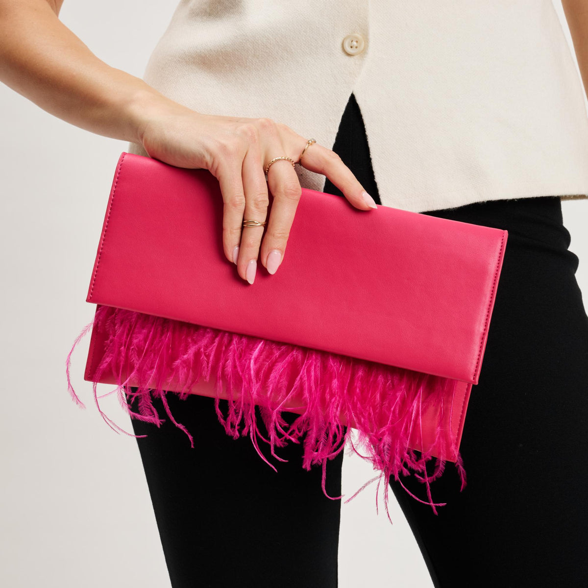 Woman wearing Hot Pink Moda Luxe Everlee Clutch 842017131151 View 1 | Hot Pink