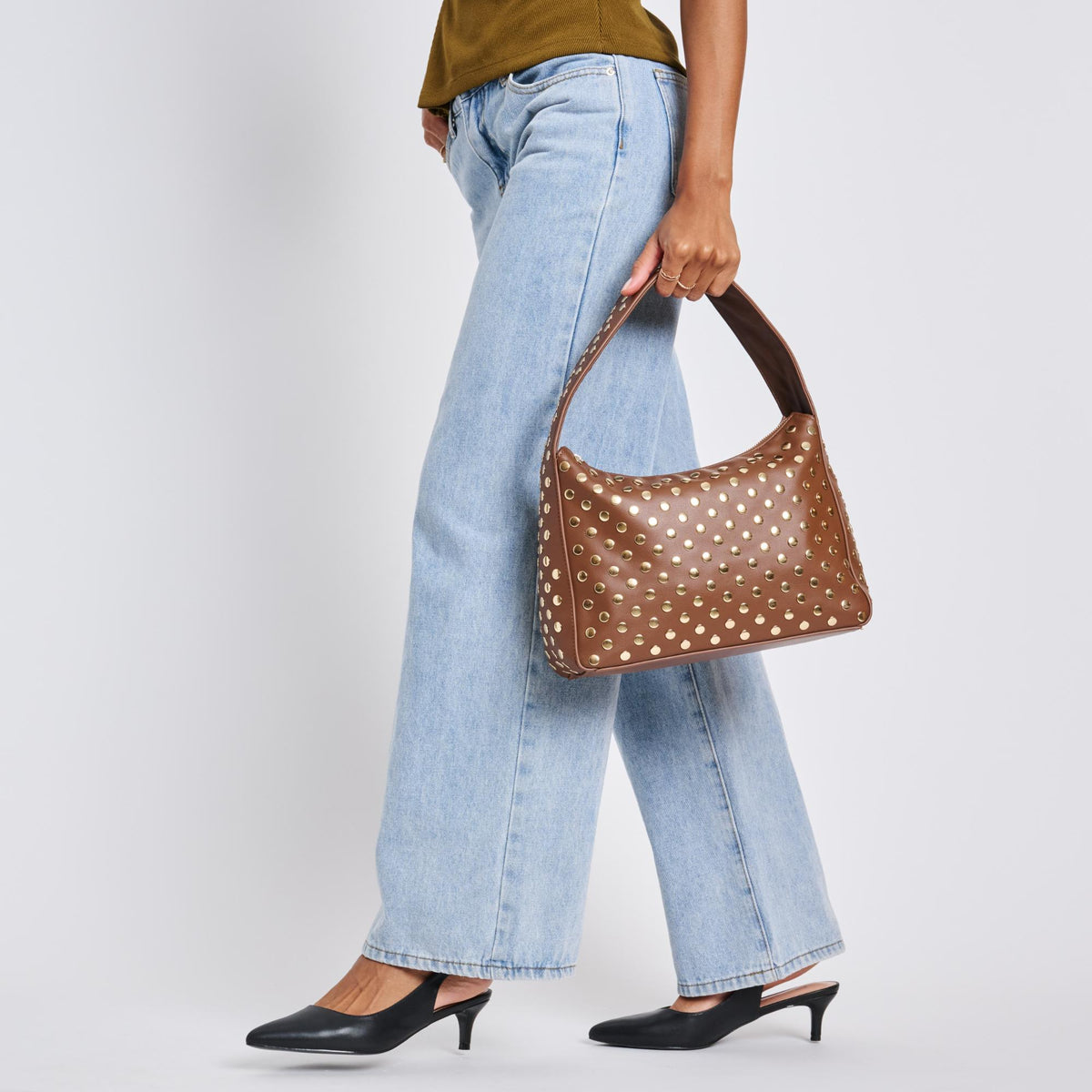 Woman wearing Chocolate Moda Luxe Rebel Crossbody 842017136477 View 3 | Chocolate