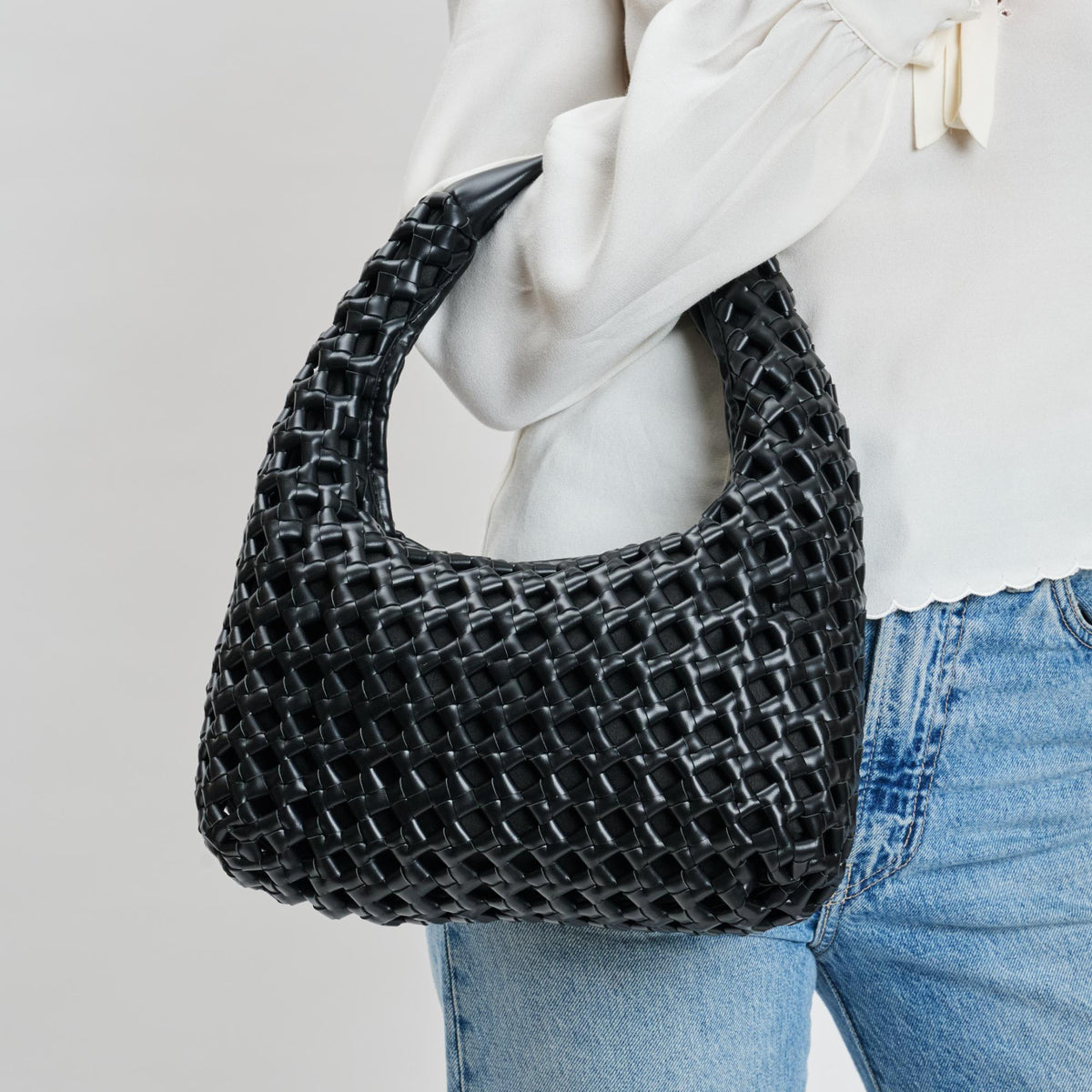 Woman wearing Black Moda Luxe Richelle Hobo 842017137511 View 4 | Black
