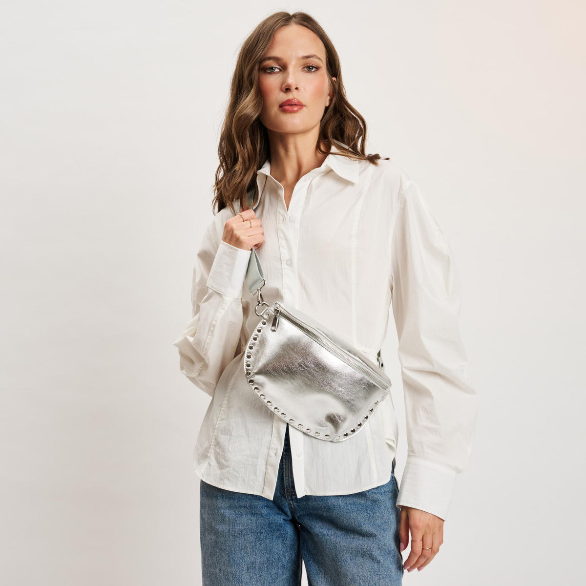 Woman wearing Silver Moda Luxe Gizelle - Metallic Belt Bag 842017141488 View 1 | Silver