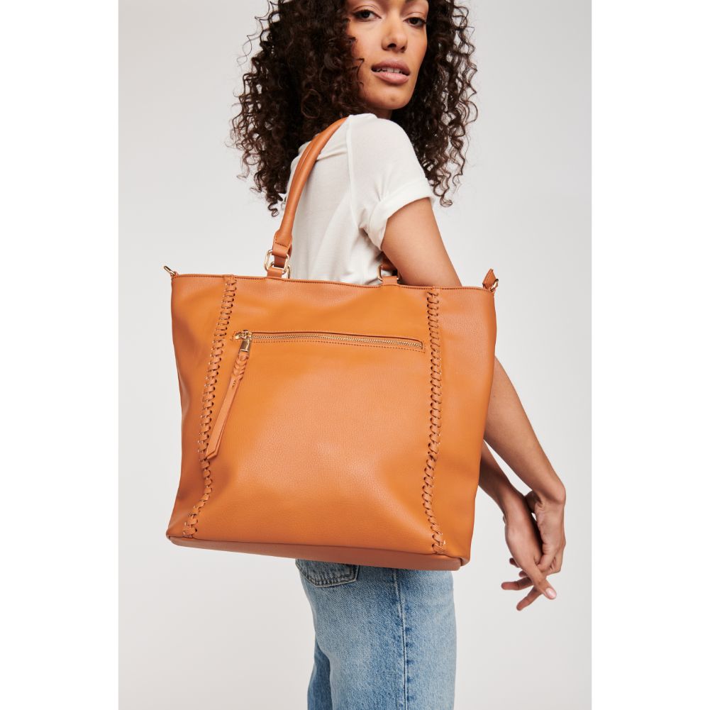 Woman wearing Tan Moda Luxe Jenna Crossbody 842017127406 View 2 | Tan