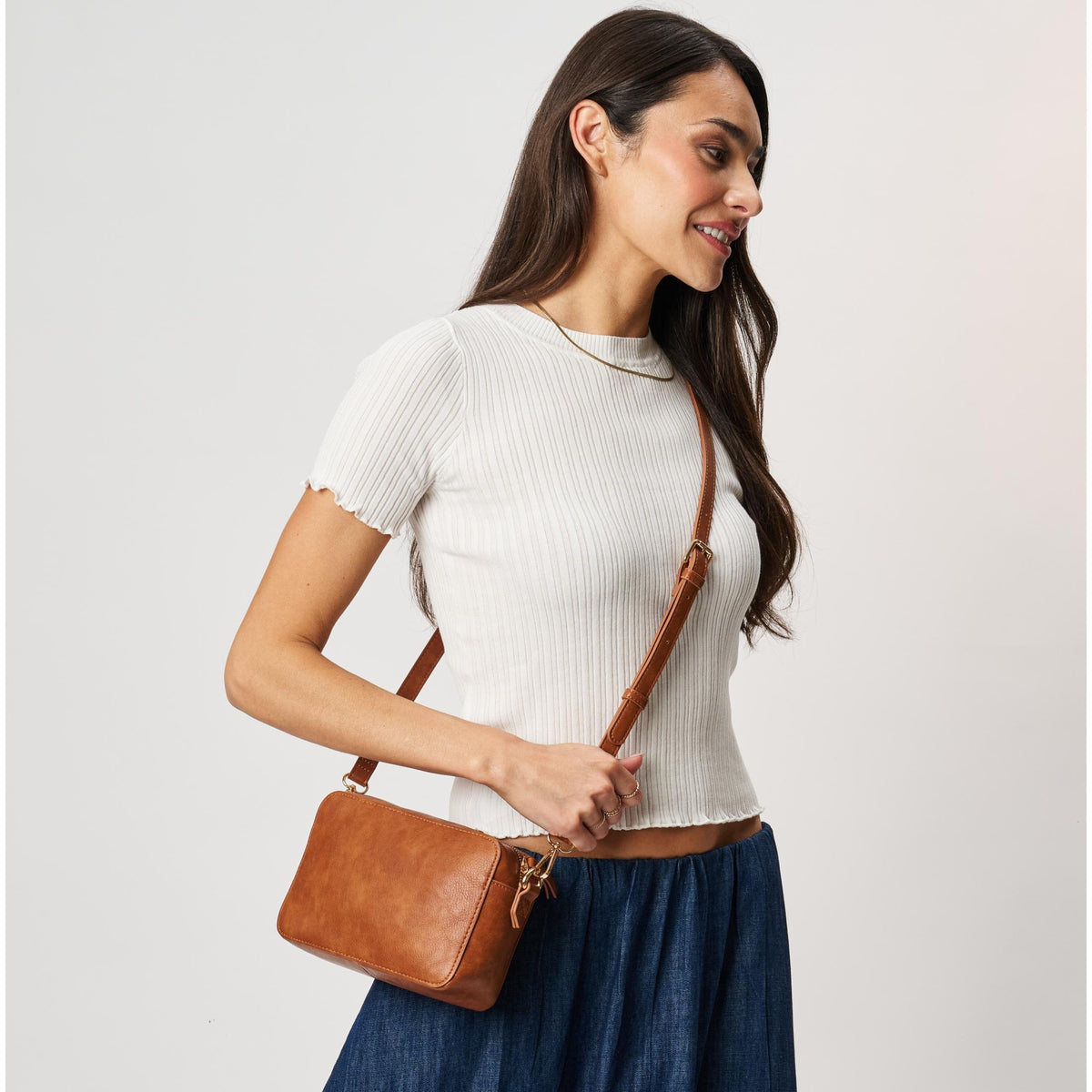 Woman wearing Tan Moda Luxe Skylie Crossbody 842017126706 View 3 | Tan