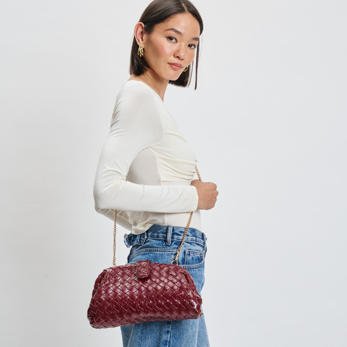 Woman wearing Red Moda Luxe GiGi Crossbody 842017139607 View 2 | Red