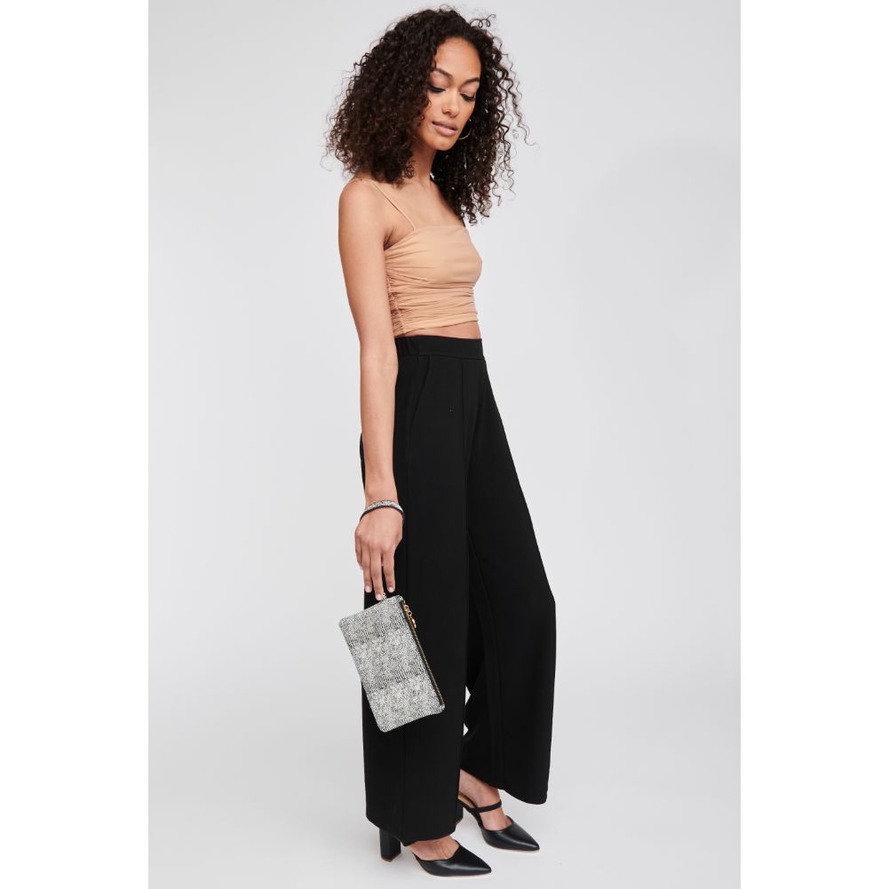 Woman wearing Black White Moda Luxe Olivia Wristlet 842017117957 View 3 | Black White