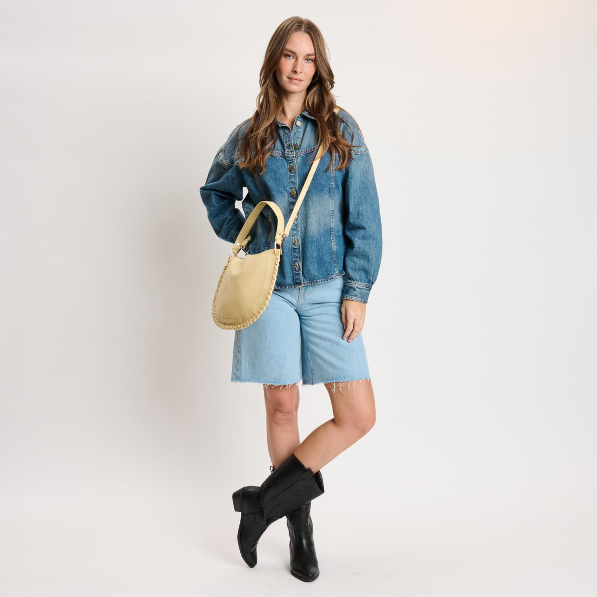 Woman wearing Butter Moda Luxe Lita Hobo 842017141099 View 2 | Butter