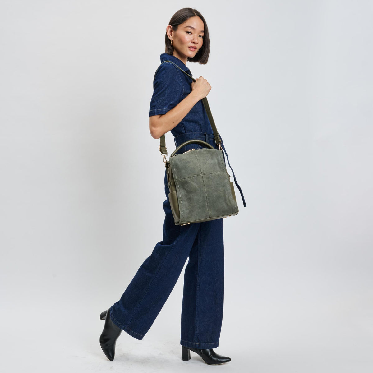 Woman wearing Olive Moda Luxe Brette Backpack 842017114697 View 3 | Olive