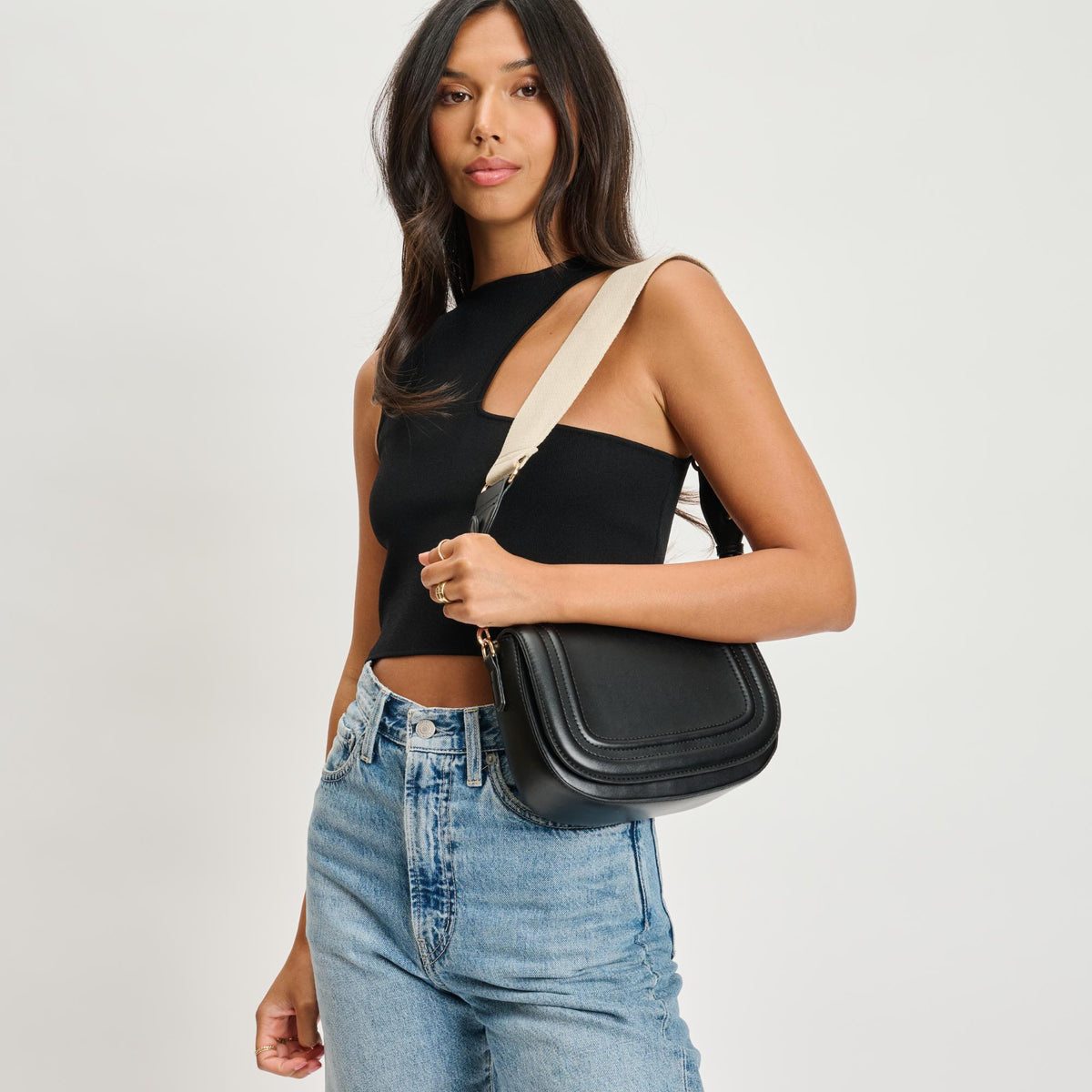 Woman wearing Black Moda Luxe Poshette Crossbody 842017134732 View 1 | Black