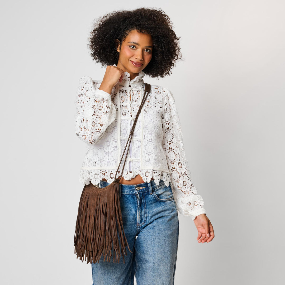 Woman wearing Chocolate Moda Luxe Arizona Crossbody 842017142317 View 2 | Chocolate