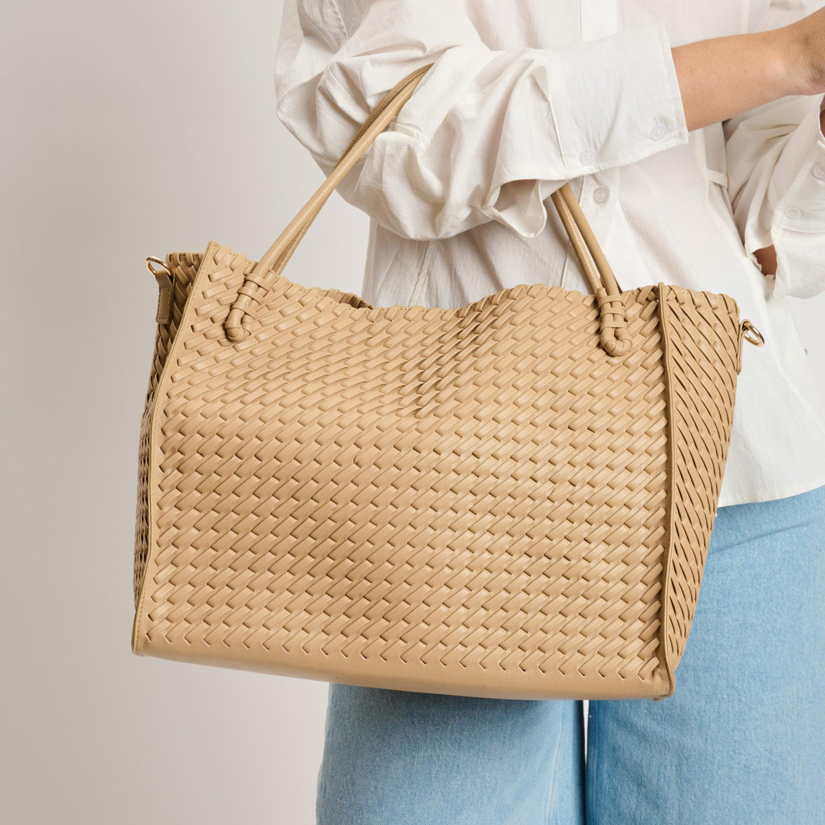 Woman wearing Natural Moda Luxe Jackie Tote 842017140832 View 1 | Natural