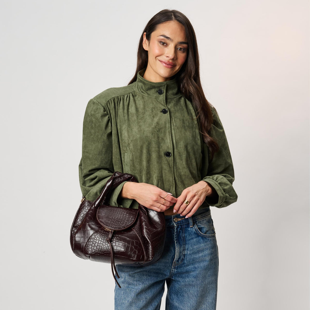 Woman wearing Chocolate Moda Luxe Amaya Satchel 842017142560 View 1 | Chocolate
