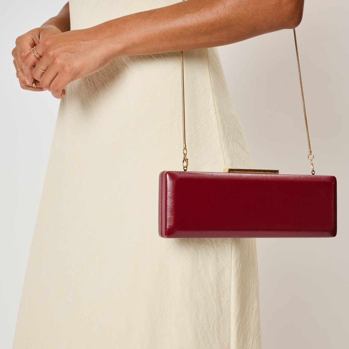 Woman wearing Wine Moda Luxe Angie Clutch 842017142485 View 1 | Wine